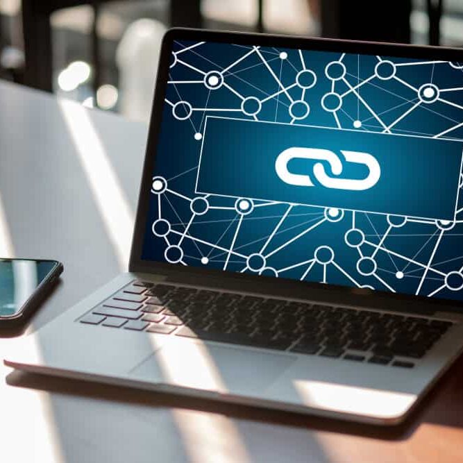 Link connection digital network visualization on laptop screen.